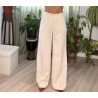 Pantalón de vestir beige con pinzas y bolsillos