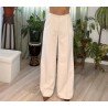 Pantalón de vestir beige con pinzas y bolsillos